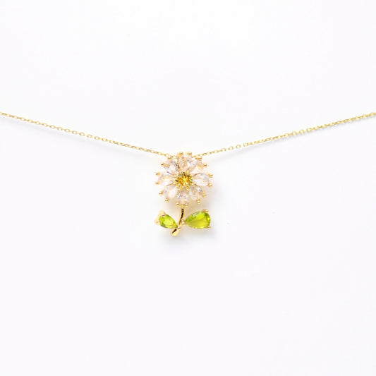 Dije “Fleur de Vie” con petalos de Zirconias y hojas de Diamantes en gota, Oro laminado